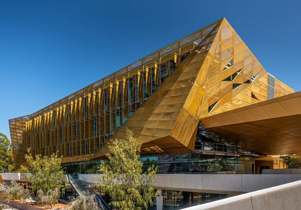 Contemporary building with gold architectural cladding